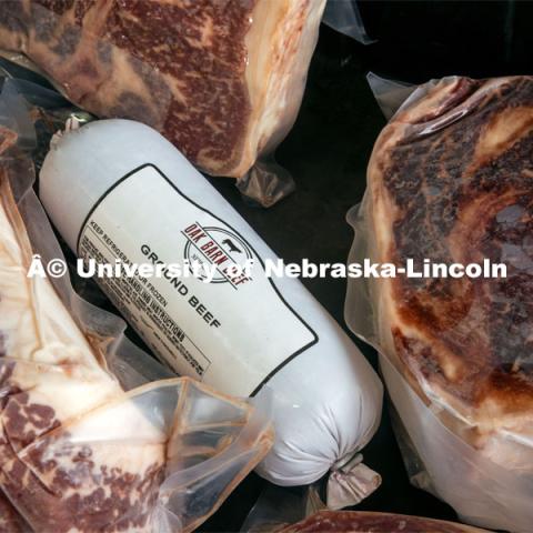 Packages of meat at Oak Barn Beef in Westpoint, Nebraska. Behind the scenes photo for the university's new "Home Again" national advertisement. June 27, 2024. Photo by Kristen Labadie / University Communication.   